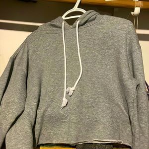 selling a crop top hoodie, size small, color gray